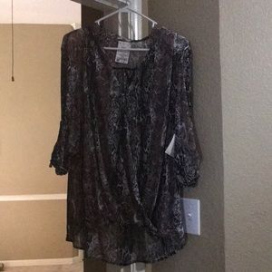 Cute blouse. Purple and black and white.